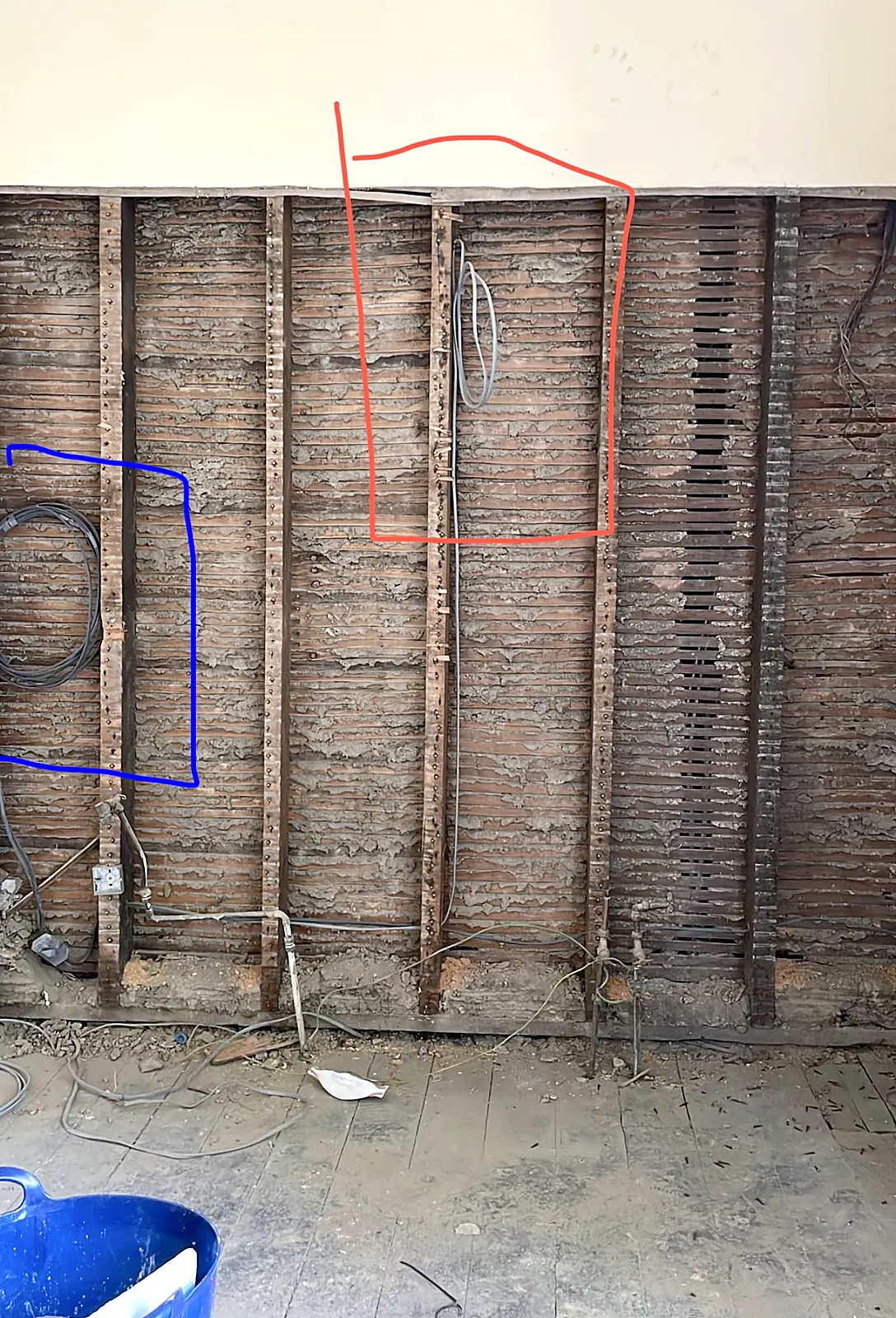 Cables chased into a solid brick wall during a house rewire first fix in Glasgow